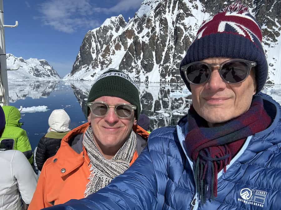 Atlas Antarctica Cruise Review (2026): At Last, On A Real Expedition Ship, the World Navigator 27 What a day! Mike & Peter on deck, with the spectacular Lemaire Channel behind them