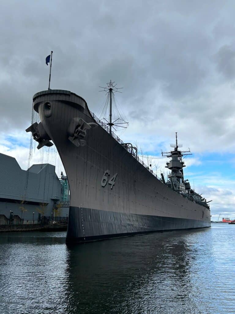 Chesapeake Bay Cruise With American Cruise Lines docks near the USS Wisconsin in Norfolk 