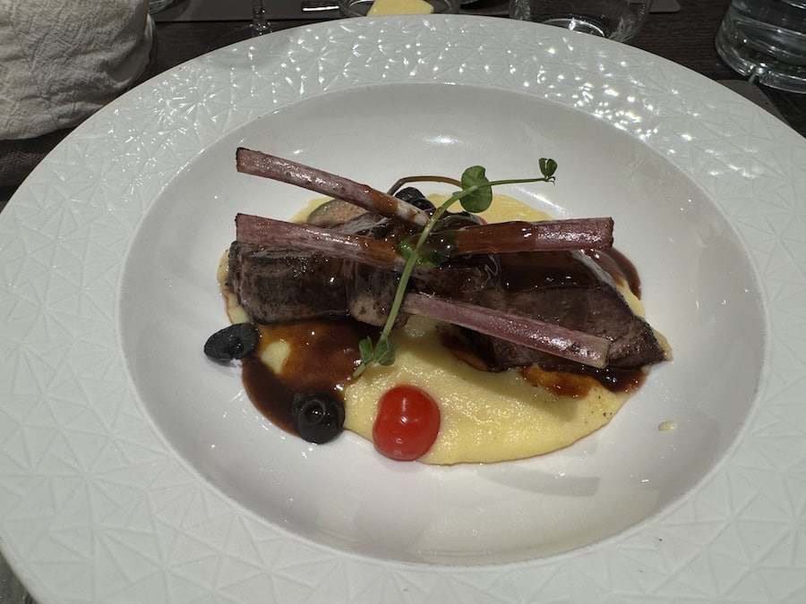 Dining on grilled lamb rack aboard a Viva German, Dutch & Belgian Waterways cruise