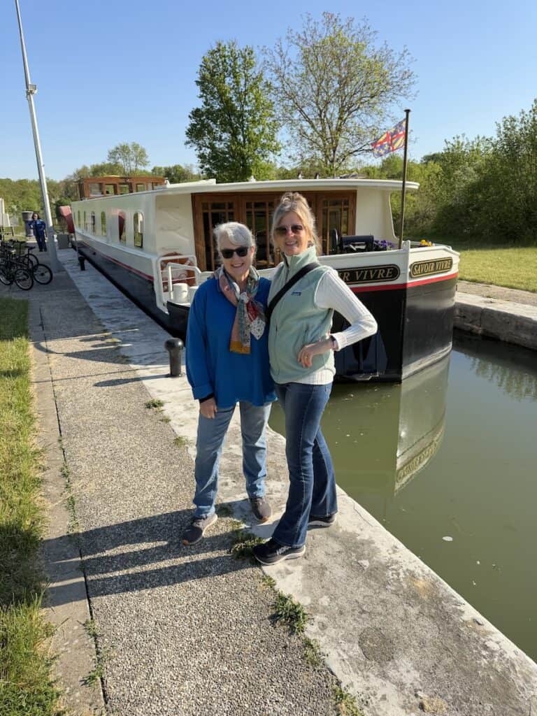 18 Of The Best French Barge Cruises You Should Know About (UPDATED 2026) 24 Deb & Heidi at the bow of Savoir Vivre.