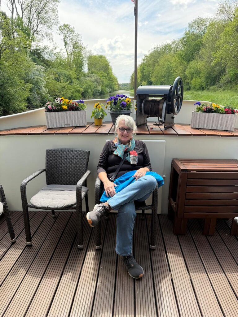 This French Barge Is Different (2026 REVIEW) — Choose The Savoir Vivre On The Burgundy Canal For The Cycling & Dinners Ashore 13 The Savoir Vivre's forward-facing outdoor public area at the bow.