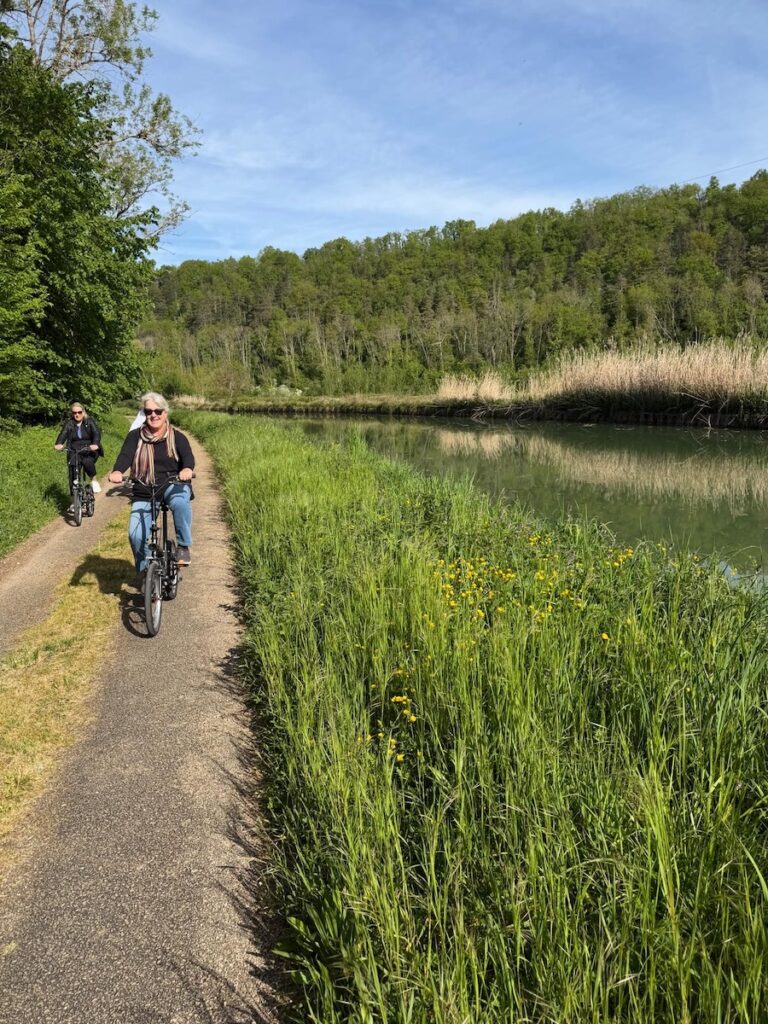 This French Barge Is Different (2026 REVIEW) — Choose The Savoir Vivre On The Burgundy Canal For The Cycling & Dinners Ashore 1 Cycling along the tow path of the Burgundy Canal. * Photo: Heidi Sarna