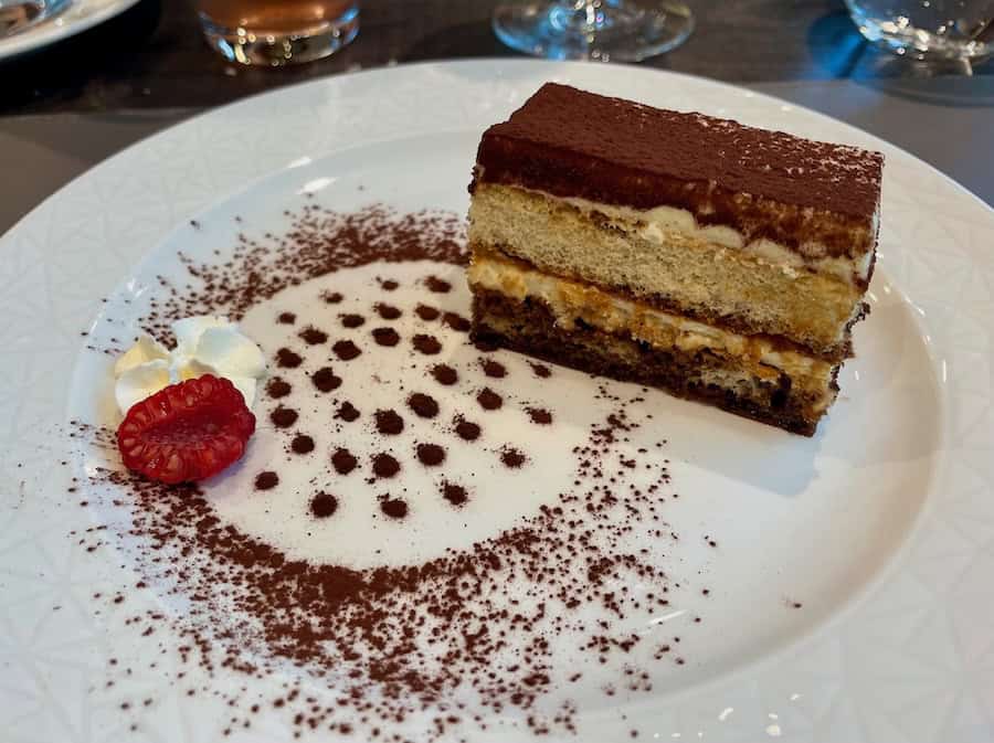 A stylish Tiramisu dessert served in the Riverside Restaurant. on a Rhine & Moselle Cruise Aboard Riviera Resplendence 