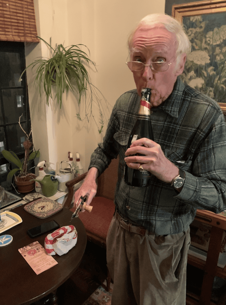 Ted Scull: A Tribute to A Dear Friend & QuirkyCruise Partner 15 Ted humorously taking a swig of Champagne from the bottle.